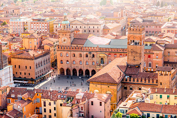 Bologna cityscape view Aerial cityscape view from the tower on Bologna old town center with Maggiore square in Italy bologna photos stock pictures, royalty-free photos & images