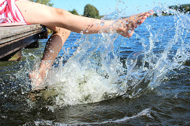 istock The girl on the dock 596077428
