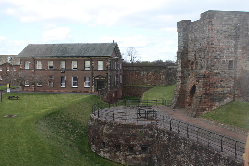 Carlisle, England, UK - April 15 2015: Inside the walls of Carlisle Castle showing the barracks and 'Lady's Walk'.