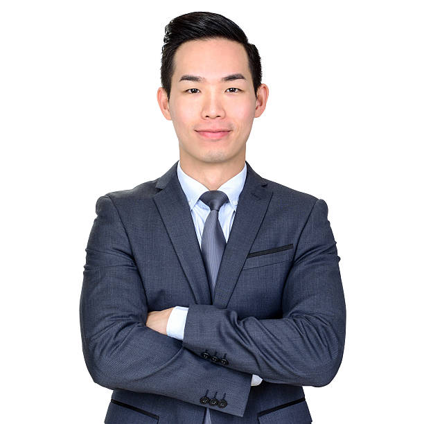 istock Young Asian businessman crossing his arms 596079668