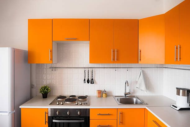 Modern orange kitchen stock photo