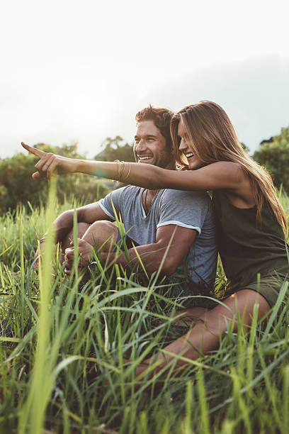 istock Attractive couple together on meadow 596081762