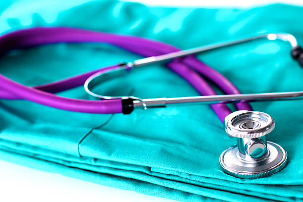 istock Medical stethoscope rests on a uniform close-up 596082168