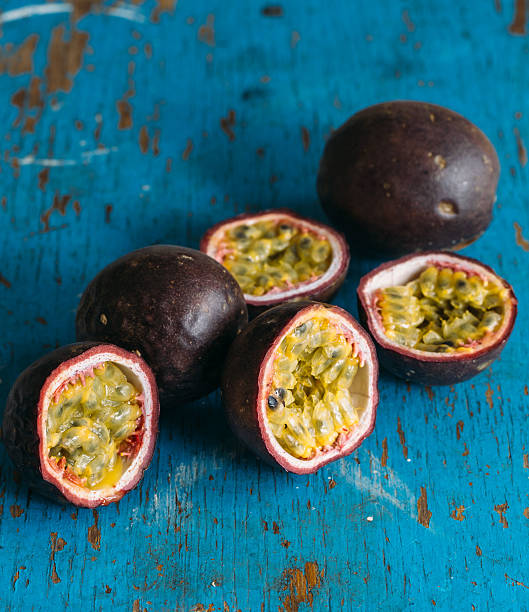 istock Fresh juicy passion fruits. Tropic fruit concept 596084632