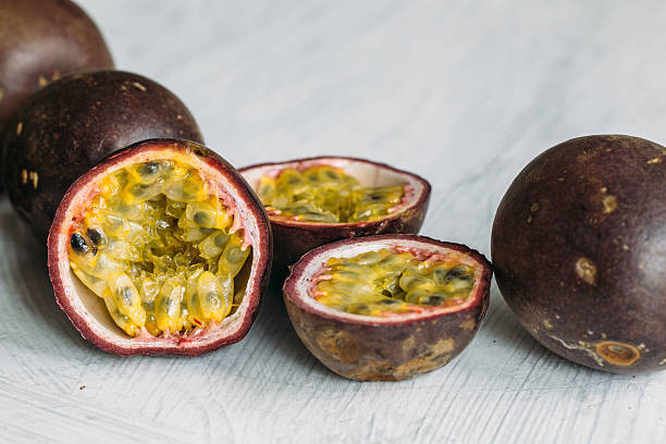 istock Fresh juicy passion fruits. Tropic fruit concept 596084712