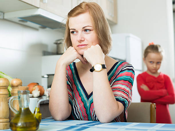 istock Frustrated mom scolding little daughter 596086712