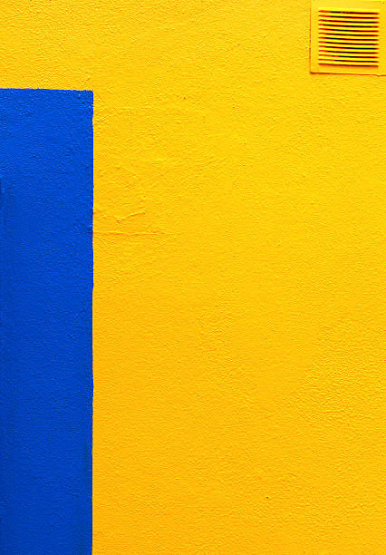 istock Cement wall with yellow and blue facade 596086824