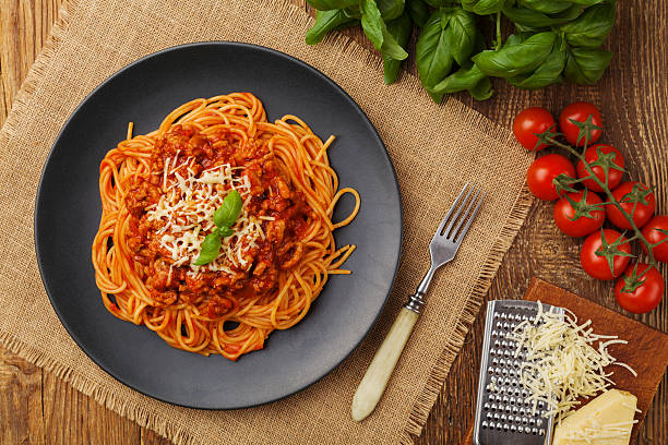 istock Delicious spaghetti served on a black plate 596087950