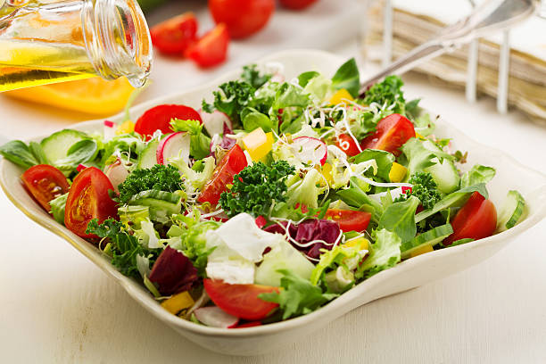 istock Spring salad with fresh vegetables from radishes and kale 596089564