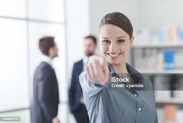 Smiling Businesswoman Pointing At Camera Stock Photo - Download Image Now - Adult, Adults Only, Business