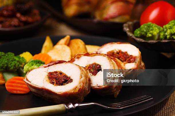 Delicious Chicken Rolls With Dried Tomatoes And Mozzarella Stock Photo - Download Image Now