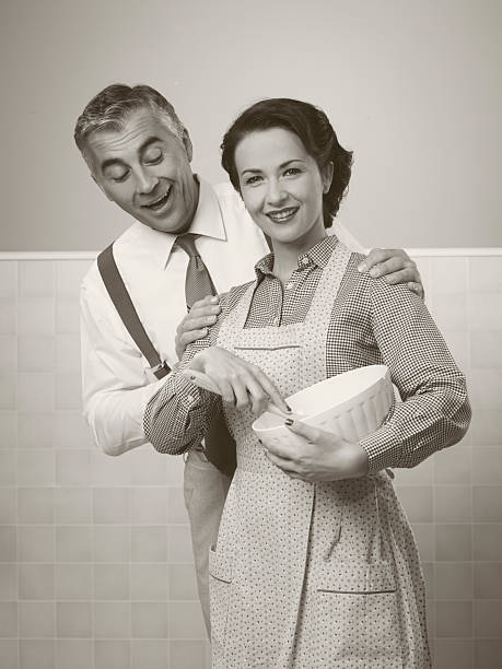 istock Loving couple cooking together 596090398