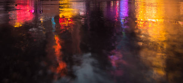 istock NYC streets after rain with reflections on wet asphalt 596093578