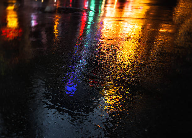 istock NYC streets after rain with reflections on wet asphalt 596093742
