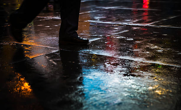istock NYC streets after rain with reflections on wet asphalt 596094232