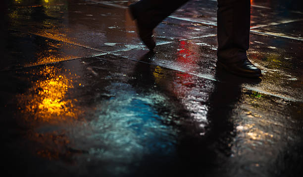 istock NYC streets after rain with reflections on wet asphalt 596094260