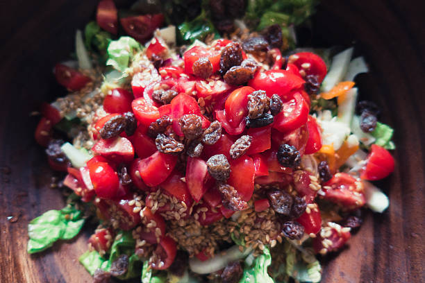 istock Summer salad in a wood bowl 596094652