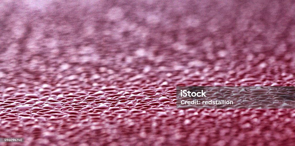 water drops on a metal surface , freshness concept picture of a morning water drops on a metal surface , freshness concept.effect added Abstract Stock Photo