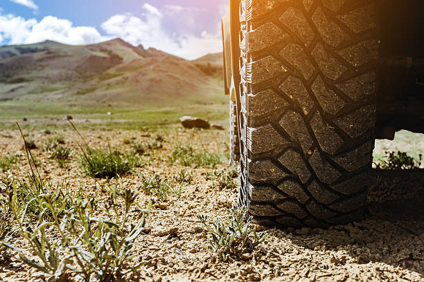 istock Closeup offroad car wheel concept 596097802