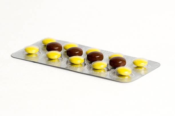 istock brown and yellow antibiotic in blister 596338154