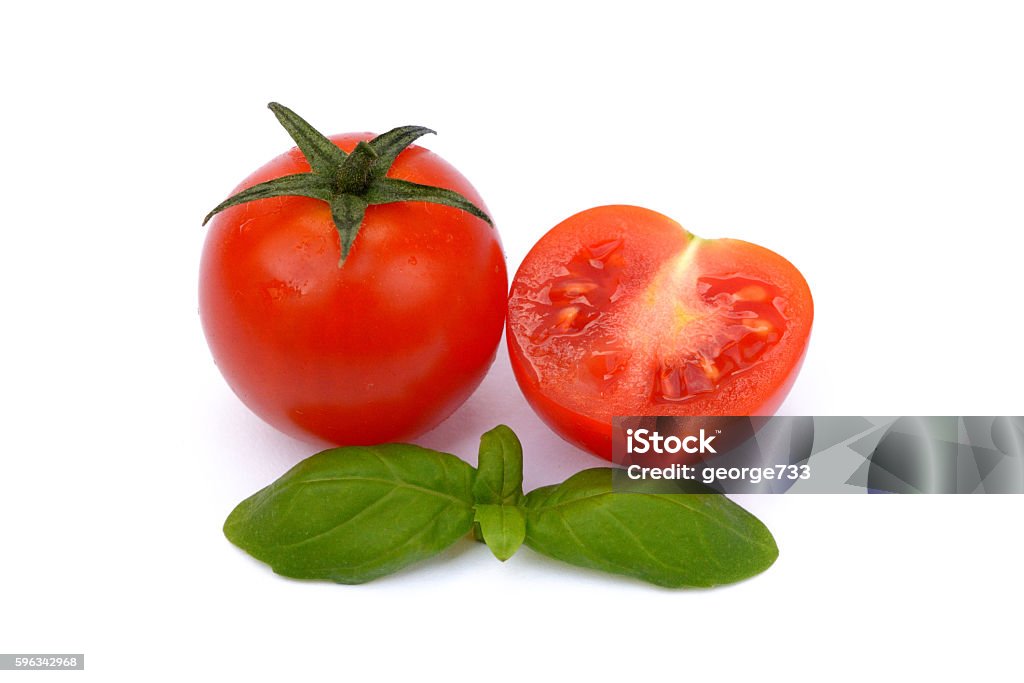 fresh tomato with basil fresh tomato with basil isolated on white background Agriculture Stock Photo