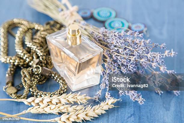 Perfume With A Bouquet Of Lavender And Jewelry Stock Photo - Download Image Now - Adult, Aromatherapy, Arts Culture and Entertainment
