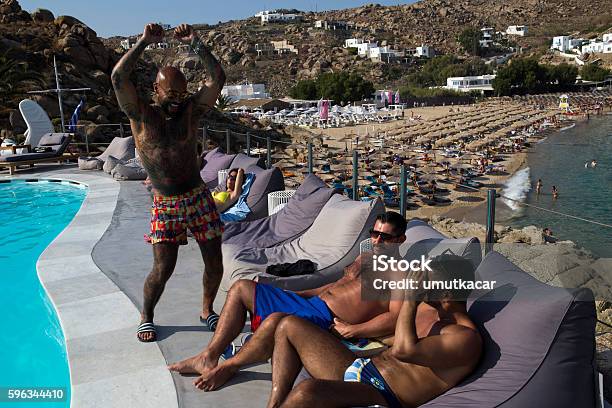 Gay People Have Fun On The Super Paradise Club Stock Photo - Download Image Now - Gay Person, Mykonos, Beach