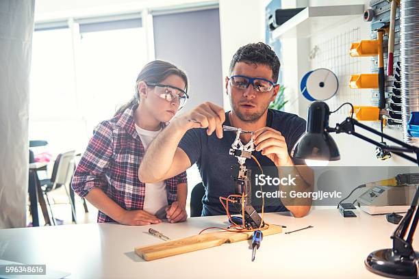 Learning From Teacher Stock Photo - Download Image Now - Robot, Child, Engineer