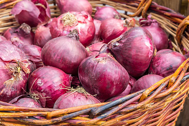 istock fresh red onions in a basket 596350850