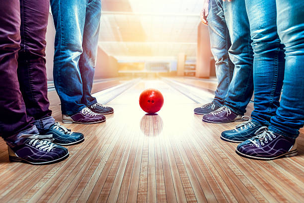 People near bowling ball