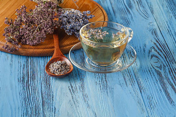 istock Herbal tea.Lavender infusion in a glass cup 596357284