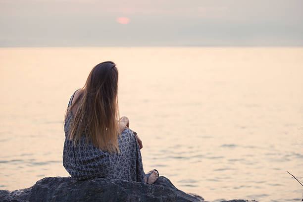 istock Women at the sea 596358172