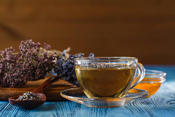 istock Composition with cup of tea and bowls of tea leaves. 596358522
