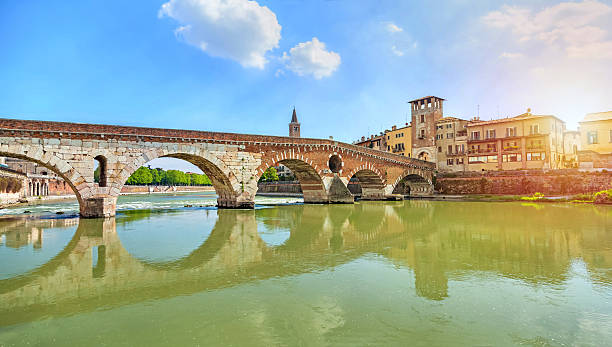 istock Ponte Pietra bridge on sunset, Verona 596359392