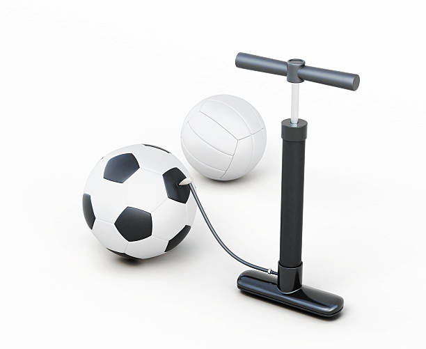 istock Hand pump and balls isolated on white background. 596359438