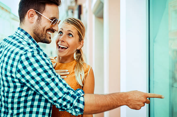 istock Young attractive couple in shopping 596363868