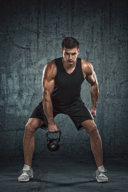 Cross Training With Kettle Bell stock photo