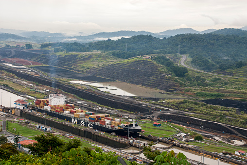 Panama, Panama - September 29, 2013: MSC Geneva Cargo Ship - Mediterranean Shipping Company Cargo Ship in Panama Canal - September 29, 2013