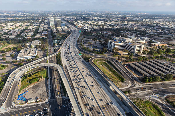 Wilshire Blvd Ramps to the 405 Freeway in Los Angeles Los Angeles, California, USA - August 6, 2016:  Aerial view of Wilshire Blvd ramps to the San Diego 405 Freeway in West Los Angeles.   highway 405 photos stock pictures, royalty-free photos & images