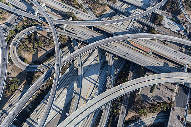 istock Los Angeles 110 and 105 Freeway Interchange Ramps Aerial 596370632