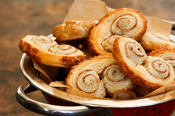 Gourmet danish puff pastries cinnamon puff pastry scrolls palmie - fotografia de stock