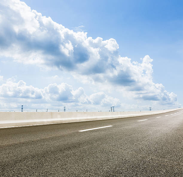 istock new asphalt roads and the blue sky 596373878