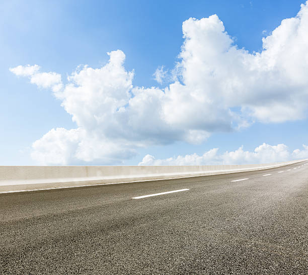istock new asphalt roads and the blue sky 596373974