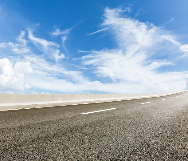 istock new asphalt roads and the blue sky 596374108