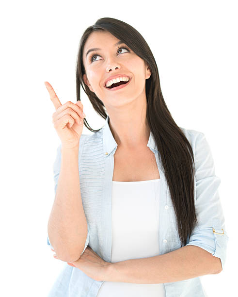 istock Thoughtful woman pointing an idea 596374164