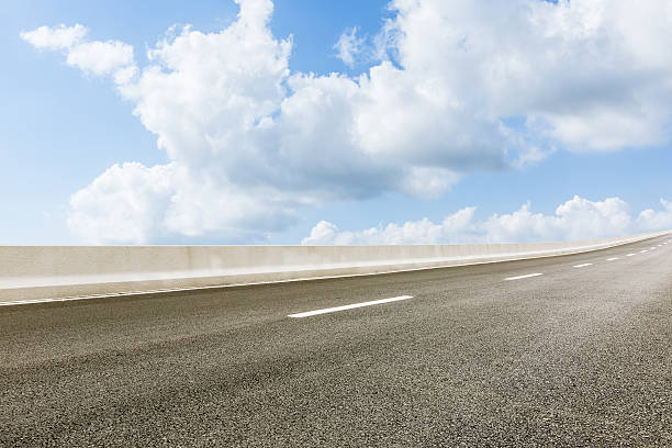 istock new asphalt roads and the blue sky 596374830