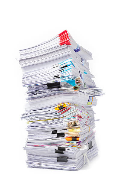 istock Stack of business papers isolated on white background 596375132