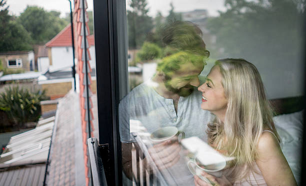 istock Loving couple relaxing at home 596376438