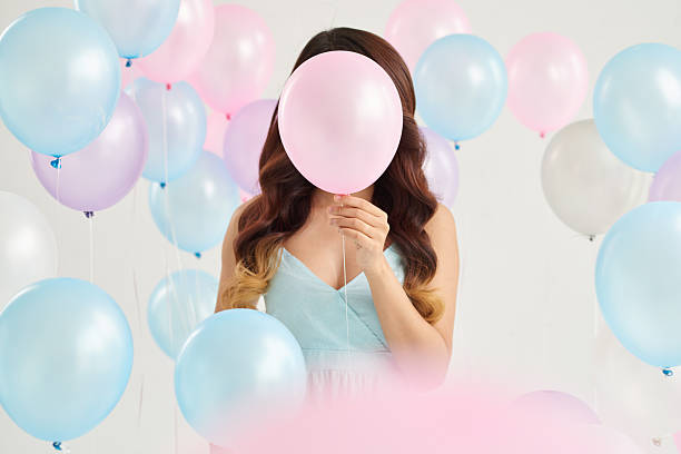 istock Girl with balloon 596380280