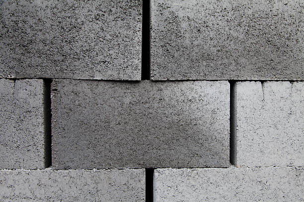 istock Gray building cement, concrete, cinder blocks  stacked close-up background 596380926